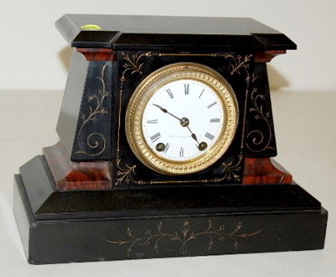 Seth Thomas & Sons Antique Slate Clock: Seth Thomas & Sons Antique Slate Clock: New York; porcelain dial; time & strike; red & black marble trim; bell strike movement. (Back glass door is cracked.) 8 1/2" x 12" All items sell As Is, Where I
