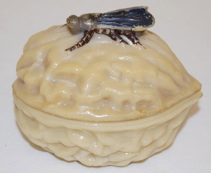Vallerystahl Fly on Walnut Covered Dish: Fly on Walnut Covered Dish: Vallerysthal; the opaque glass is butterscotch colored; fly has most original black paint remaining; it is signed on the bottom. (The inner rims of both pieces have one or 