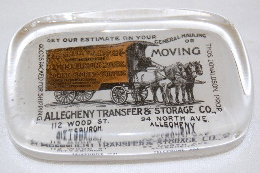 Glass Advertising Paperweight: Glass Advertising Paperweight: old; show is a horse drawn wagon belonging to the Allegheny Transfer & Storage Co. Thos. Donaldson Prop.; w/ much more wording on it; rectangular. (Several small edge ni