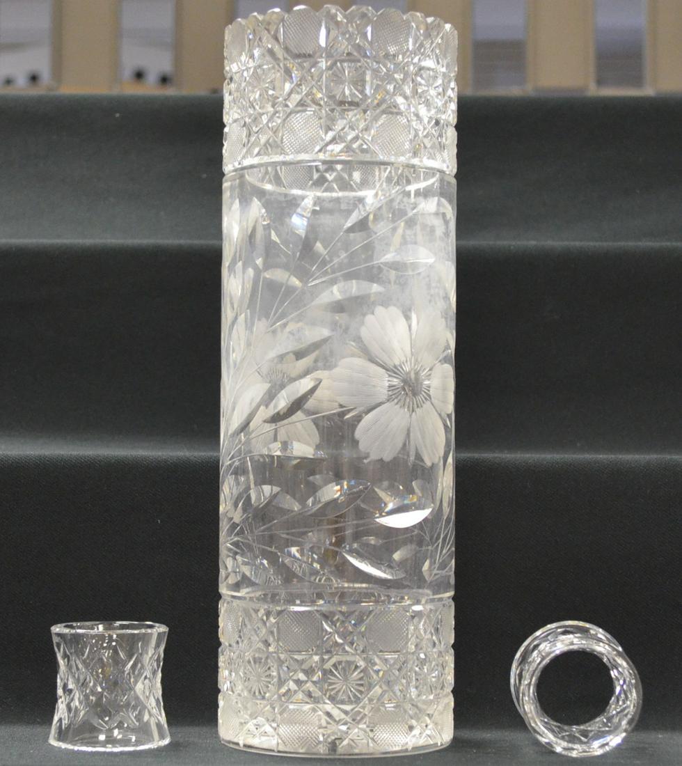 Waterford Napkin Rings and a Vase: Waterford Napkin Rings and a Vase. The 8 rings are wasted and have diamond pattern. 2" Long. 2) Cylinder vase with pressed and wheel gound floral. 12 1/8"T.