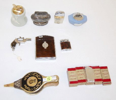 18 Assorted Cigarette Lighters, Stangl, Wedgwood: 18 Assorted Cigarette Lighters: 1.) Wedgwood, new in box; 2.) Stangl Pottery lighter; 3.) Ronson Table lighter; 4.) Japan Bellows Shaped Lighter; 5.) Ronson Cigarette case lighter; 6.) Fire-Lite Delux