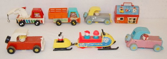 7 Vintage Fisher Price Toys: Trucks, Cars +: 7 Fisher Price Toys: Trucks, Cars +: 1.) USA 649 Fisher Price Truck. 2.) #616 Fisher Price Tow Truck. 3.) Fisher Price Toy Lunch Pail & Thermos. 4.) #705 Mini Snow Mobile. 5.) 3 #674 Wood Sports Cars.