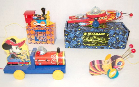 4 Fisher Price Toy Town Toys, Mickey, Choo Choo: 4 Fisher Price Toy Town Toys : 1.) #6550 Buzzy Bee, no box. 2.) #432 Mickey Mouse Choo Choo, no box. 3.) #6575 Train Engine 4.) #980750 Space Blazer. Largest 13 1/2" L. All modern; all mint or near mi