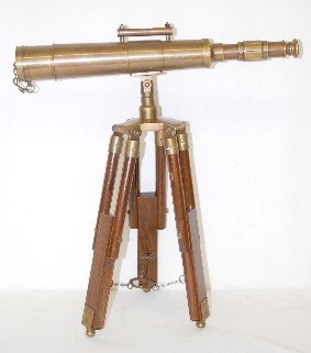 Surveyors Telescope, Brass, and Tripod: Surveyors Telescope, Brass, and Tripod: the scope has a level mounted on the top; both telescope and tripod are unmarked. Telescope is 17 1/4" Long; tripod with scope mounted is 19" Tall. (In as is as