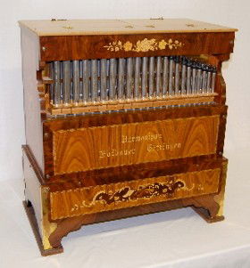 Hofbauer Inlaid Wooden Pipe Organ, Portable: Hofbauer Pipe Organ, Portable: Also referred to as a Hurdy Gurdy, Grind or Monkey Organ; this one is circa 1980-1985; it plays compressed air on 17 wood and 46 metal pipes; powered by electricity (rec