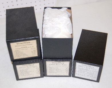 4 Wurlitzer Band Organ Paper Rollers: 4 Wurlitzer Band Organ Paper Rollers: dated on the boxes, 1981; they are all titled Military Band Organ and each carries 10-12 tunes; also labeled Style 125. In as is as found condition. All items sel