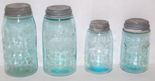4 Early Mason Fruit Jars, All Aqua, 1858: 4 Early Mason Fruit Jars, All Aqua: in 2 sizes; with milk glass inserts in the zinc lids; they all have November 30, 1858 patent date. 2 are 5 1/2" Tall; 2 are 7 1/2" Tall. In as is as found condition