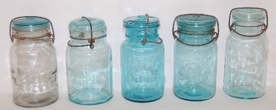 5 Antique Fruit Jars with Glass Lock On Lids: 5 Fruit Jars with Glass Lock On Lids: 1.) "Wide Mouth Telephone"; 7" Tall. 2.) "The Daisey - F.E. Ward & Co."; 7 3/4" Tall. 3.) "Sure Seal"; 7 1/2" Tall. 4.) "Fosters SealFast"; 7 1/2" Tall. 5.) "McDo