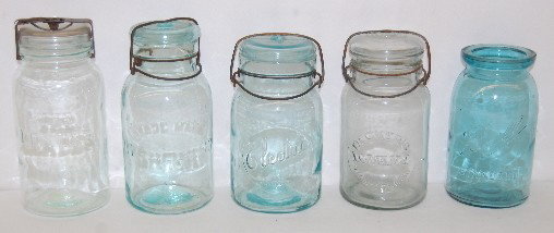 5 Fruit Jars, Dark and Light Aqua: 5 Fruit Jars, Dark and Light Aqua: 1.) Deckers Iowana - Mason City Iowa; 7 1/2' Tall. 2.) "Trade mark Lightning - Putnam 465"; 7 3/4" Tall. 3.) Electric; 7 1/4" Tall. 5.) Ball Standard; 6 1/2" Tall; (