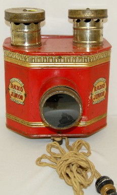 Magic Lantern - Radio Junior by H.C. White: Magic Lantern - Radio Junior by H.C. White: made by H.C. White of Vermont; described as a post card projector; powered by electricity. 11" T x 9" D x 9" W. (Shows some use; knob handle on back access