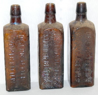 3 Hostetler & Bitters Bottles; Dark Amber: 3 Hostetler & Bitters Bottles; Dark Amber: 8 3/4" Tall. In as is as found condition. All items sell As Is, Where Is, no guarantees of any kind. We accept Mastercard & Visa, no paypal, no personal chec