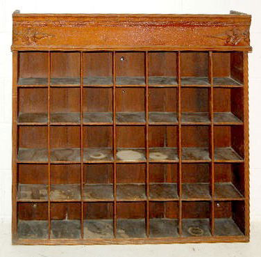 35 Section Oak Barber Shaving Mug Cabinet: 35 Section Oak Barber Shaving Mug Cabinet (Top gallery sides are missing.) 37 1/2" T x 39" W (In as is, as found, used condition.) This Item Ships F.O.B., this means, you, the buyer, must make packing