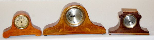 Ansonia and U.S.A. Wooden Mantel Clocks: Ansonia and U.S.A. Wooden Mantel Clocks: 1.) Made in U.S.A., marked celluloid dial; with seconds bit; beveled glass; running at this time. (Dial yellowed.) 2.) Not marked; gold colored metal dial; inl