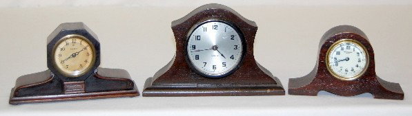 Ansonia, New Haven & Gilbert Mini Mantel Clocks: Ansonia, New Haven & Gilbert Mini Mantel Clocks: 1.) Ansonia Octagon humpback mantel; marked paper dial. (Not running; dial yellowed.) 2.) New Haven humpback mantel; marked porcelain dial; running at 