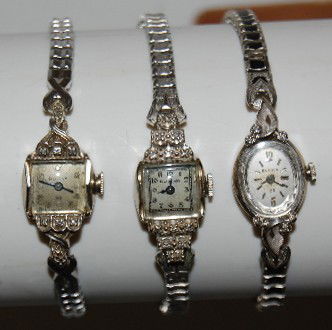 3 Bulova 14K White Gold & Diamond Ladies Watches: 3 Bulova 14K White Gold & Diamond Ladies Watches: 1.) 17J, Unadj., 5AF movement; in a 14K white gold Bulova case No. 003507. On the case's top there are 6 diamonds on each side; the band is a Speidel