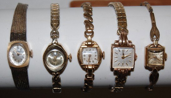 5 Ladies Gold Wrist Watches, 4 are14K, 1 is 9K: 5 Ladies Gold Wrist Watches, 4 are 14K, 1 is 9K: 1.) Gruen 17J; unadjusted; N225R; working movement in a 14K yellow gold case Speidel gold filled 8 stainless steel flexband. 2.) Jaeger Le Coultre 17J;
