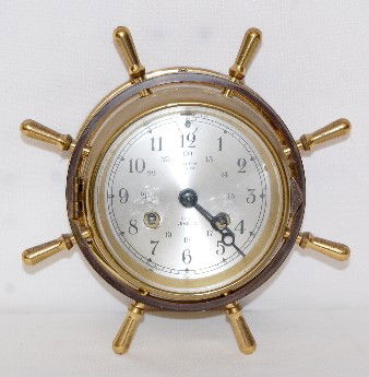 Salem Ships Bell 8 Day Clock: Salem Ships Bell 8 Day Clock: marked metal silver dial; running at this time. (Wear to case finish; dial lightly scratched.) Dial 3 1/2"; Case 6 1/2". All Items Sell As Is, Where Is, No Guarantees of