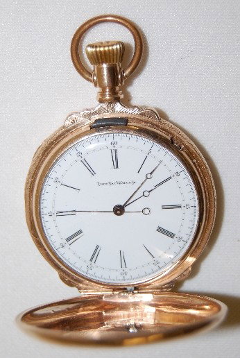 Elgin 18S, 15J, Hunting Case Pocket Watch: Elgin 18S, 15J, SW, LS, GF, Hunting Case Pocket Watch: S.N. 940465; with a large seconds hand on a flat dial with Roman numerals. In a yellow, box hinged hunting case marked BII with a Crown, Warrante