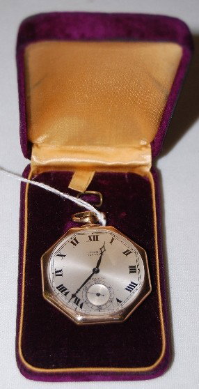 Gruen Veri-Thin 17J Pocket Watch in Original Box: Gruen Veri-Thin 17J Pocket Watch in Original Box: 14S, OF, SW&S; GF; S.N. 474119; adjusted 5 positions temperature, also marked Suisse; with an octagonal silver dial with blue hands and black Roman nu