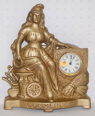 Commerce Iron Front Clock: Commerce Iron Front Clock: made by the Golden Novelty Co. in Chicago; Patent date of 1883. Running at this time. 12 5/8" T x 10 1/2" W All Items Sell As Is, Where Is, No Guarantees of Any Kind. You mu