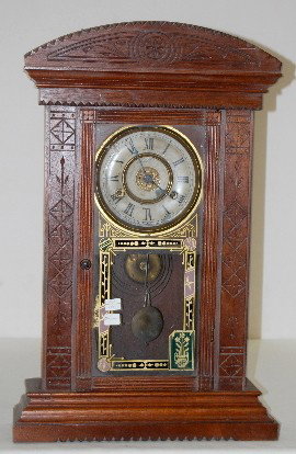 Jerome Walnut Parlor Clock with Alarm: Jerome Walnut Parlor Clock with Alarm: T & S. Not tested. (Worn dial.) 32" All Items Sell As Is, Where Is, No Guarantees of Any Kind. You must contact our office at 641-754-4890 to make payment arrang