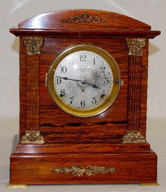 Seth Thomas Sonora Chime Mantel Clock: Seth Thomas Sonora Chime Mantel Clock: has pendulum; Seth Thomas Sonora Chime marked silver colored dial; 4 bell strike; 3 key holes; brass movement marked Made in U.S.A. 89M; red adamantine case with