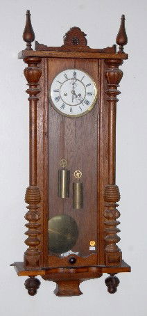 2 Wt. Signed Freiburg Carved Vienna Regulator Cloc: 2 Wt. Signed Freiburg Carved Vienna Regulator Clock: 4931; porcelain dial w/ seconds bit, 2 weights and pendulum. (Crack in the door wood; missing bottom finial; small dents in the weights.) Not teste