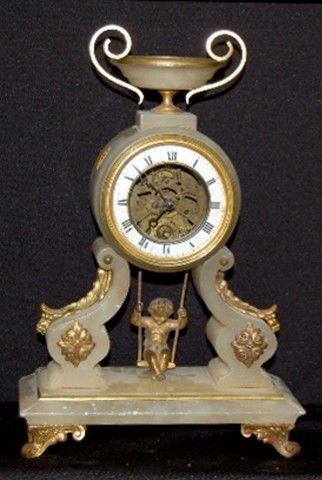 French Alabaster To & Fro Doll Swinger: French Alabaster To & Fro Doll Swinger: porcelain chapter ring with visble escapement; has key. Not tested. All Items Sell As Is, Where Is, No Guarantees of Any Kind. You must contact our office at 64