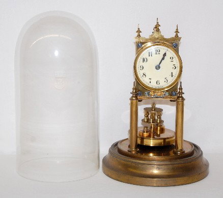 Gustav Becker Rotary Pendulum Dome Clock: Gustav Becker Rotary Pendulum Dome Clock: porcelain dial marked K.C.Cz. Germany; rotary disk pendulum; brass movement marked Gustav Becker Medaille D'or No. 2281951. Running. (Base finish is worn; min