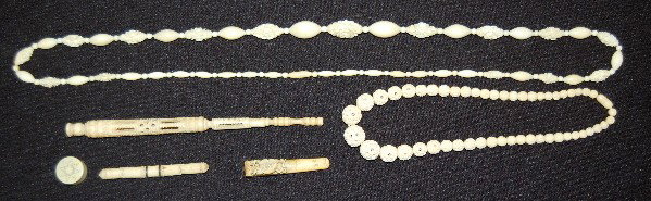 Ivory Necklaces & Other Jewelry Related Items: Ivory Necklaces & Other Jewelry Related Items: 1.) Ivory necklace with oblong pieces separated by floral carvings. 35" L. 2.) Ivory necklace of graduated carved balls, the largest are intricate with o