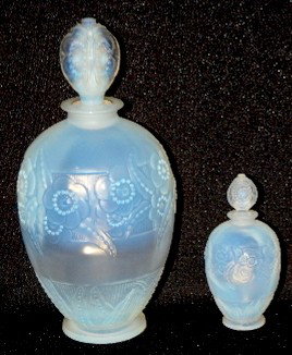 2 Sabino Art Glass "Fleurs" Perfume Bottles: 2 Sabino Art Glass "Fleurs" Perfume Bottles: 1.) Marked Sabino, Paris; 3 3/4" with stopper. 2.) Large "Fleurs" Perfume Bottle: incised Sabino, Paris and embossed Sabino, Paris; also with paper label "