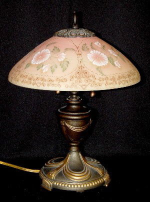 Fenton Glass Burmese Table Lamp, Electric: Fenton Glass Burmese Table Lamp, Electric: floral painted shade; marked inside the shade "F. Spindler 731/950 Fenton; hand painted P. Lane"; metal urn style base marked Berman 3102. No condition probl