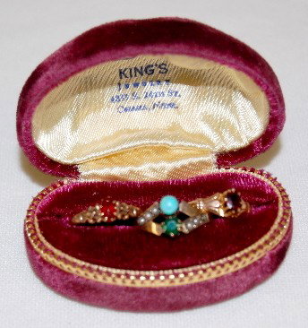 3 Gold Rings With Stones: 3 Gold Rings With Stones: 1.) Marked 10K, it has a dark colored ruby. 2.) Victorian period emerald and opal. 3.) Ruby. (One is separated at the bottom.) The stones are not tested for authenticity.