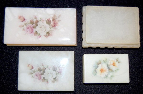 4 Alabaster Dresser Boxes, Assorted Sizes: 4 Alabaster Dresser Boxes, Assorted Sizes: 3 with floral decoration; 1 plain; two have paper label saying Genuine Alabaster Made in italy; plain one has metal feet and looks older than the othert thre