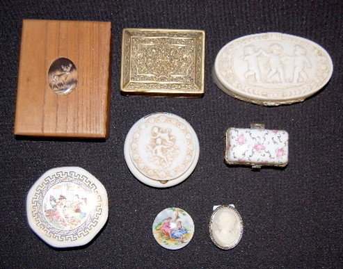 8 Wood, Metal and China Boxes: 8 Wood, Metal and China Boxes: contemporary porcelain medallion deer decorated box; decorative brass box; porcelain topped pill box; Estee Lauder cameo perfume box with contents; German oval dancing c