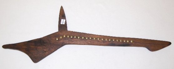 War Club with Spike Blade: War Club with Spike Blade: possibly for powwow use; handle has 21 brass tacks and simple metal designs on each side; made of unknown wood. The weapon is 26" L.; the metal blade is 4 5/8" L.