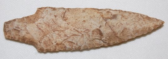 Paleo Style Stemmed Spear Tip: Paleo Style Stemmed Spear Tip: made from a dirty white or gray stone. 3 11/16" L.