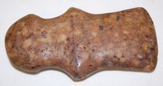 Barbed Axe Head: Barbed Axe Head: made from a conglomerate type stone. 5 7/8" L x 2 7/8" W.