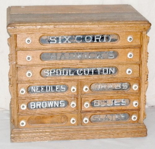 9 Drawer Chadwick Oak Spool Cabinet: 9 Drawer Chadwick Oak Spool Cabinet: original glass panels; original porcelain knobs. (Glass panels have some paint loss; porcelain knobs are not all perfect; top surface may have had a board replaced