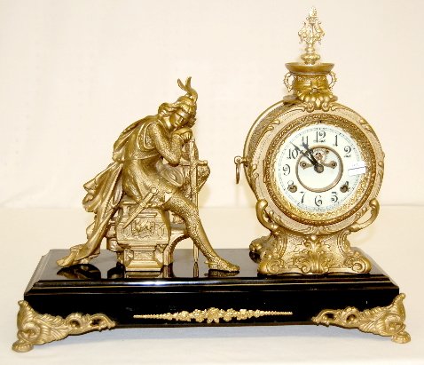 New Haven "Ivanhoe" Statue Clock: New Haven "Ivanhoe" Statue Clock: signed porcelain open escapement dial; unsigned movement; complete. 17" x 20" (Dial has hairlines.)