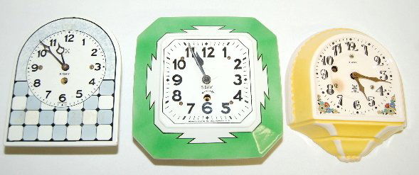 3 China Plate Wall Clocks, Newark Clock Co. +: 3 China Plate Wall Clocks, Newark Clock Co. +: 1.) Germany 8 day with round top and checkered bottom; tin can movement. (Back door and pendulum missing.) 2.) Newark Clock Co. 8 day square with tin can