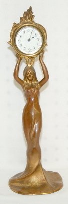 Antique Art Nouveau Lady Clock: Antique Art Nouveau Lady Clock: porcelain dial; copper/brass patina. 13 3/4" T