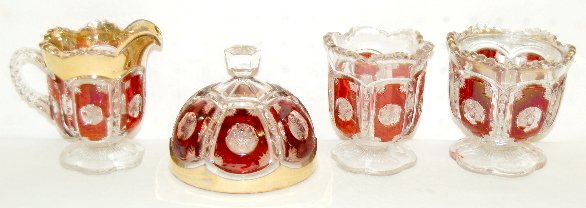 EAPG Ruby Stained Glass Table Set, Partial : EAPG Ruby Stained Table Set, Partial: Creamer, sugar, spooner, butter cover. (No sugar lid or butter base; some gold and red stain loss.)