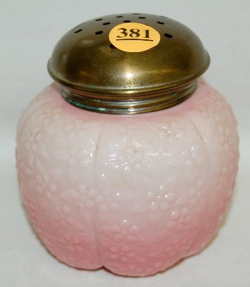 Challinor & Taylor "Forget Me Not" Muffineer: Challinor & Taylor "Forget Me Not" Muffineer: variegated pink opaque glass with a metal lid. 4" T (Small chip on the outside threads.)