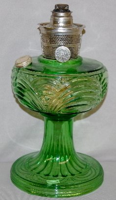 Aladdin B-40 Green "Washington Drape" Lamp: Aladdin B-40 Green "Washington Drape" Lamp: round base with partial Model B burner. 8 1/2"T (Air bubble on the top of the lamp.)