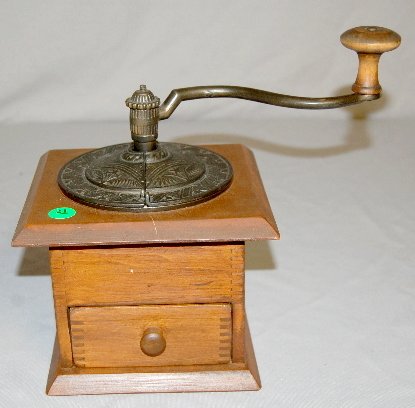 Table Top Wood & Metal Coffee Mill: Table Top Wood & Metal Coffee Mill: nice decorative metal cover; dovetail construction. 10" T (Crack in the top wood in front of the grinder.)