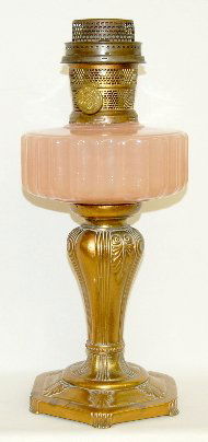 Aladdin B-121 Rose Moonstone "Majestic" Lamp: Aladdin B-121 Rose Moonstone "Majestic" Lamp: with rose gold plated base and Model B burner. 11 1/2" T (Small bubble beside fill cap.)