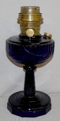 Aladdin B-76 Cobalt "Tall Lincoln Drape" Lamp: Aladdin B-76 Cobalt Blue Crystal Art Glass "Tall Lincoln Drape" Lamp with Model B burner; crow feet interior design under foot. 10 1/4" T No condition problem.