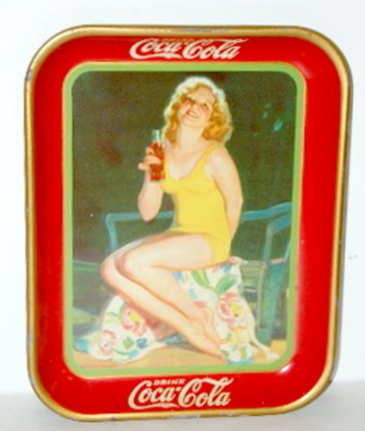 1932 Tin Litho "Coca Cola" Tray: Girl in Swimsuit: 1932 Tin Litho "Coca Cola" Tray: Girl in Swimsuit holding a Coca Cola bottle. 13 1/4" x 10 1/2" Condition 7-8
