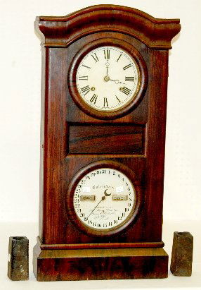 Seth Thomas Parlor No. 1 Double Dial Calendar: Seth Thomas Parlor No. 1 Double Dial Calendar: weight driven; T & S; paper dials; rosewood case. Not tested. 33"x 16 1/2" (Minor veneer loss; cleaned case.)